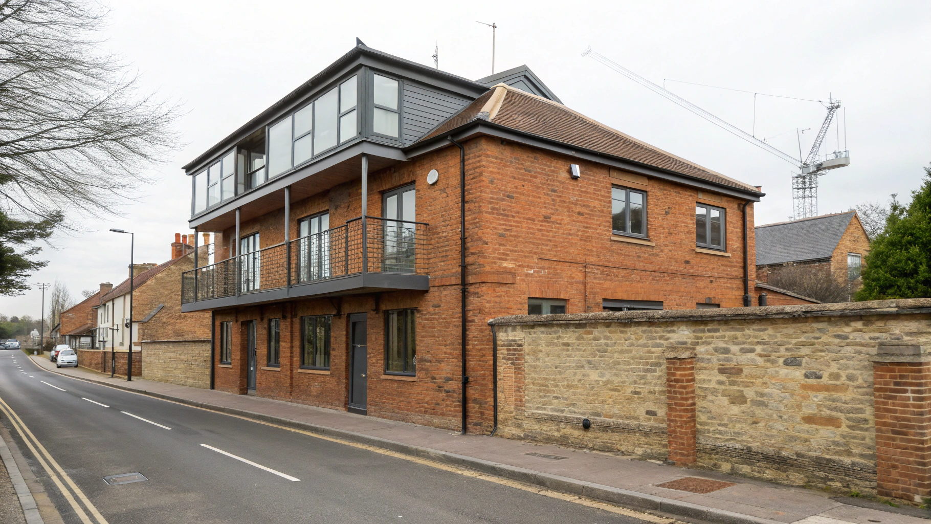 Exterior view of the historic Tottenham building and community residential facilities